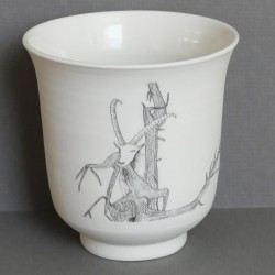 White porcelain cup ibex...