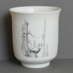 White porcelain cup ibex...